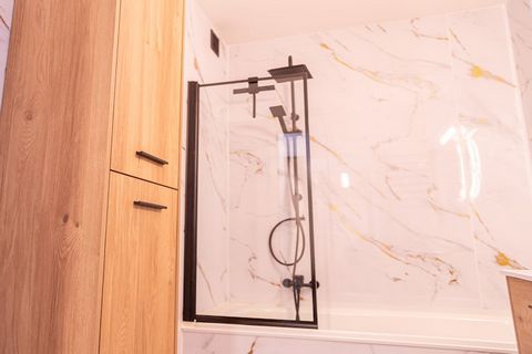 Step into your recently renovated haven, a chic apartment designed for ultimate relaxation. Decorated in a trendy boho style, you'll instantly feel that vacation vibe. The inviting living room boasts full-width, wall-to-wall windows that frame a magn...