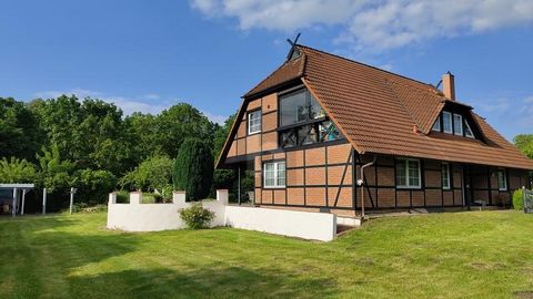 This exclusive two-family house in Lübow offers luxury and comfort at the highest level. With a total of 8 spacious rooms, 3 bathrooms, garage, carport, several terraces, a greenhouse and much more, this property leaves nothing to be desired. The dre...