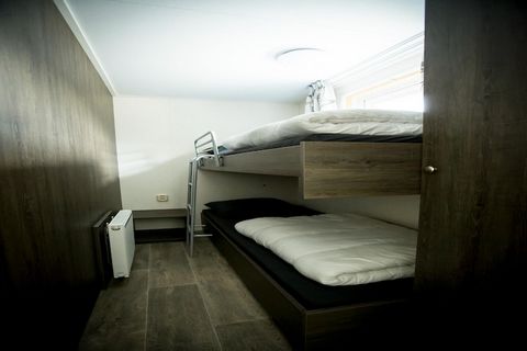 The lodges at Holiday Resort Duinhoeve come in many different types and sizes. There are two different 4-person lodges: the Bos Lodge (NL-5071-14) and the slightly smaller Delta Lodge (NL-5071-15). Both accommodations feature a comfortable interior a...